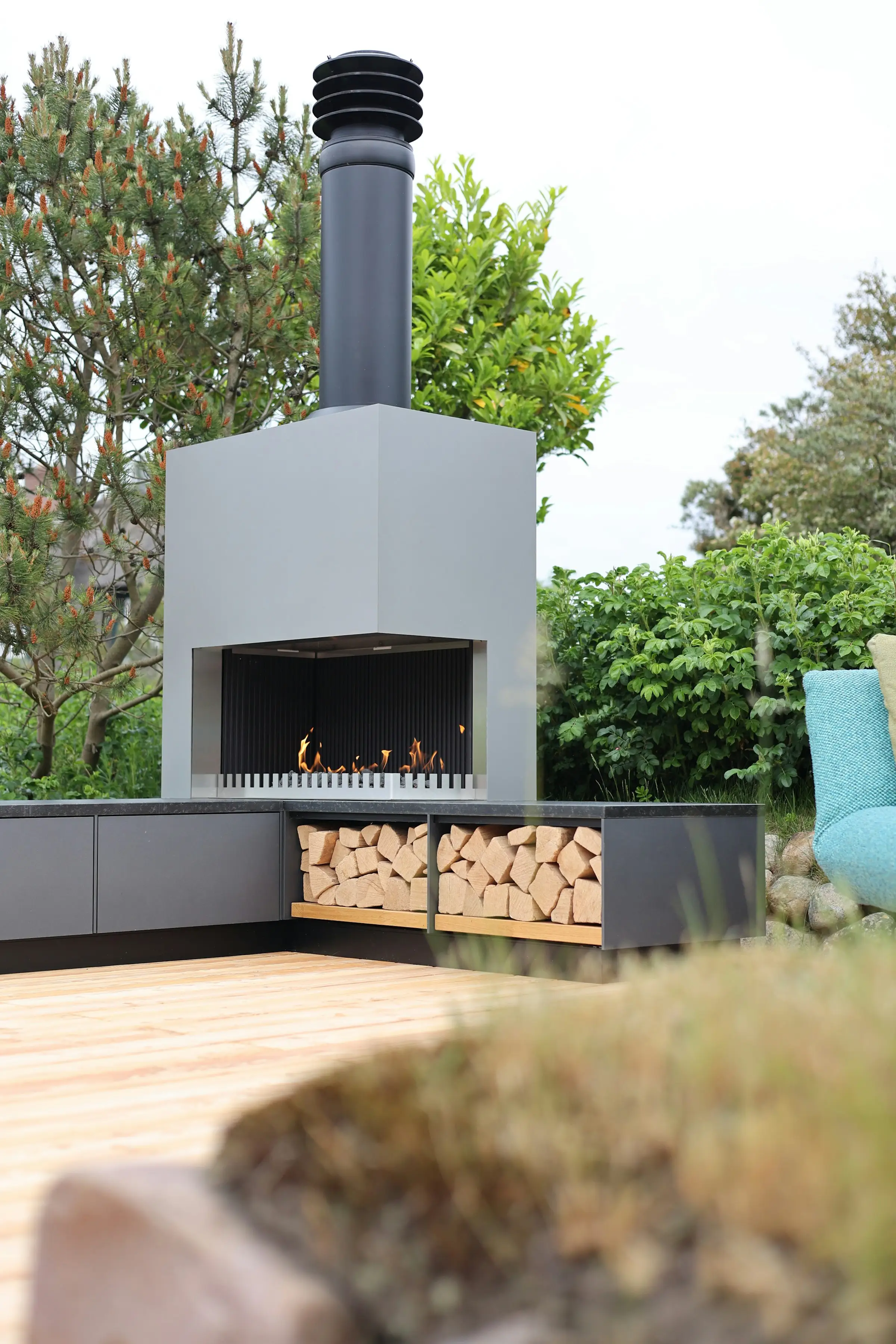 Timber deck with fire pit and city view