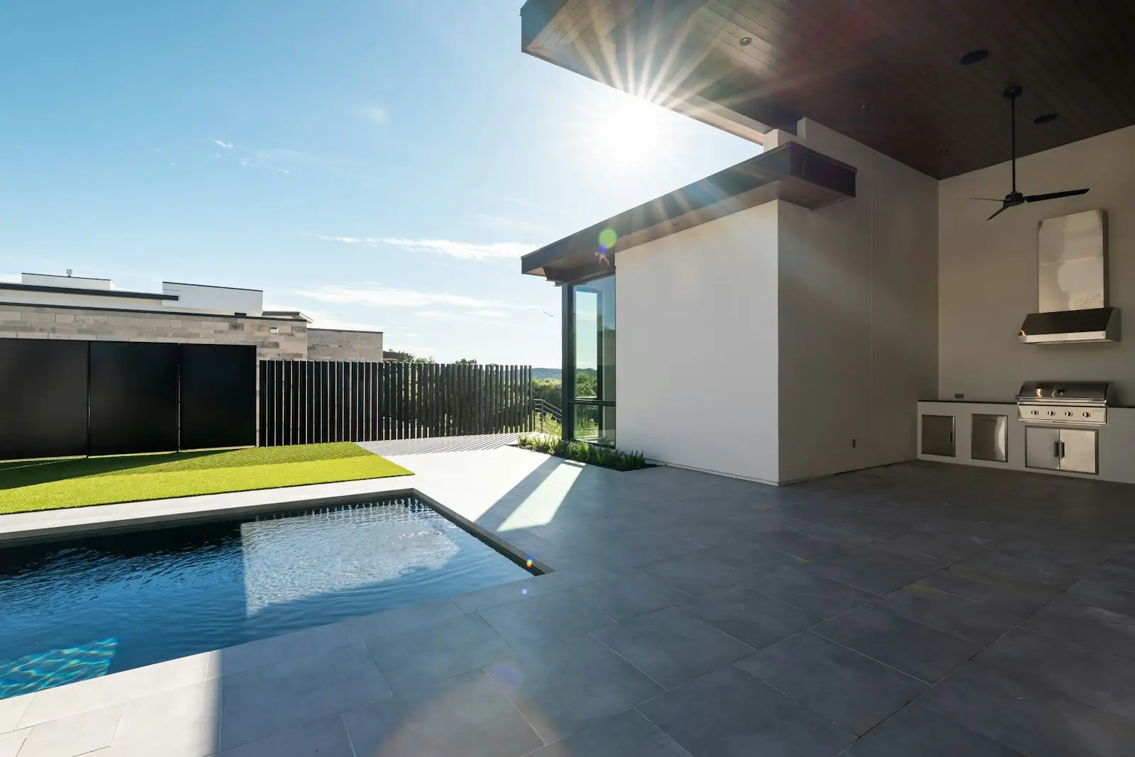 Plunge pool with stone coping and planting